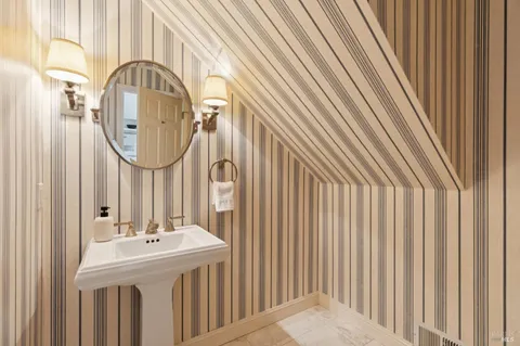 a bedroom with a bed and a table