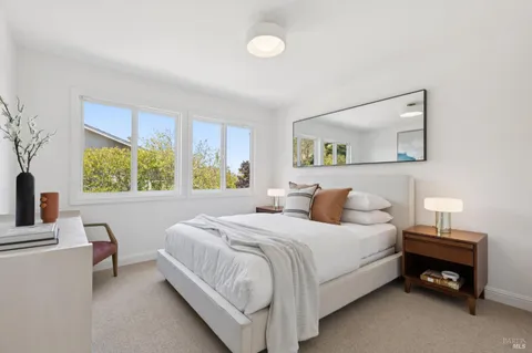 a view of a house with backyard and porch