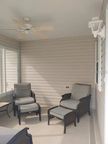 a view of a terrace with furniture