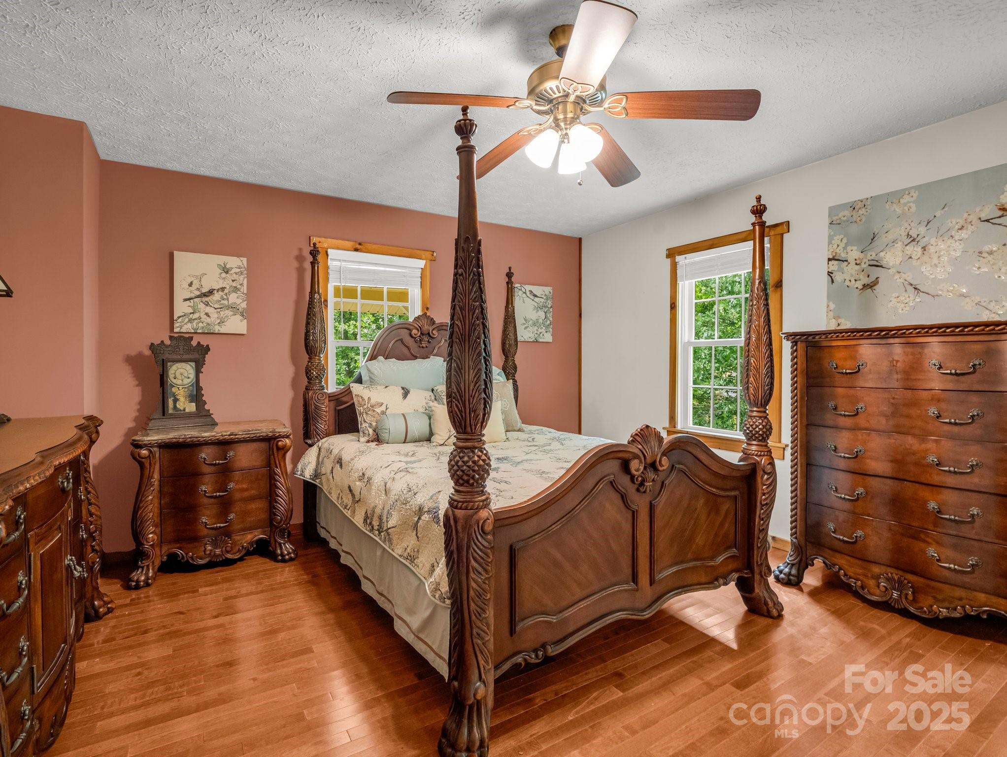 4086 Big Island Road Rutherfordton, NC 28139 - Photo 16 of 47 a bed room with a bed and a chandelier