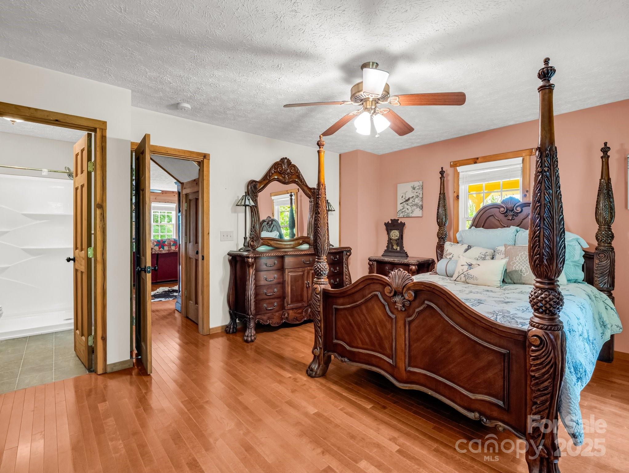 4086 Big Island Road Rutherfordton, NC 28139 - Photo 17 of 47 a bedroom with furniture and a chandelier