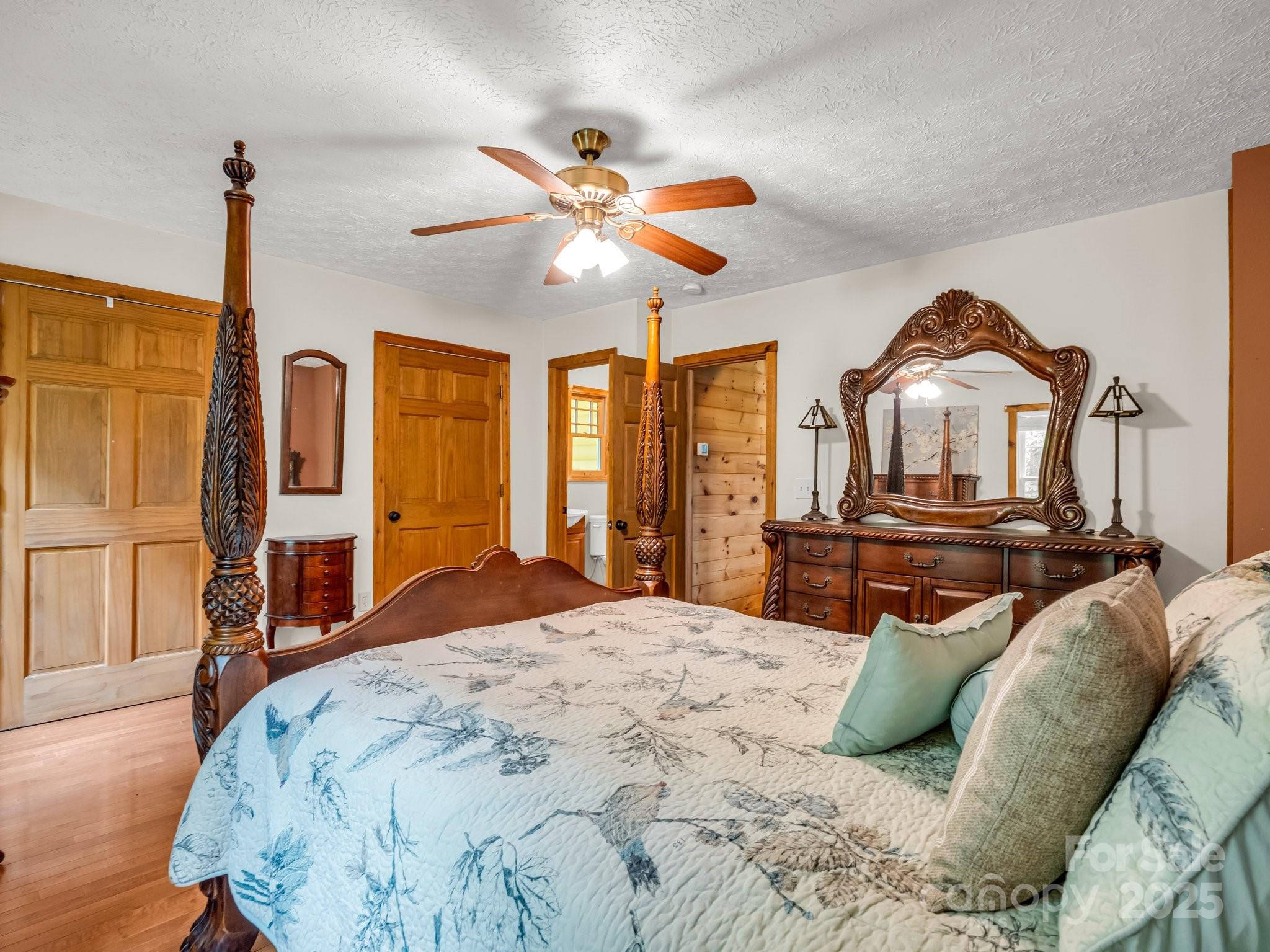 4086 Big Island Road Rutherfordton, NC 28139 - Photo 18 of 47 a bedroom with a bed and wooden floor