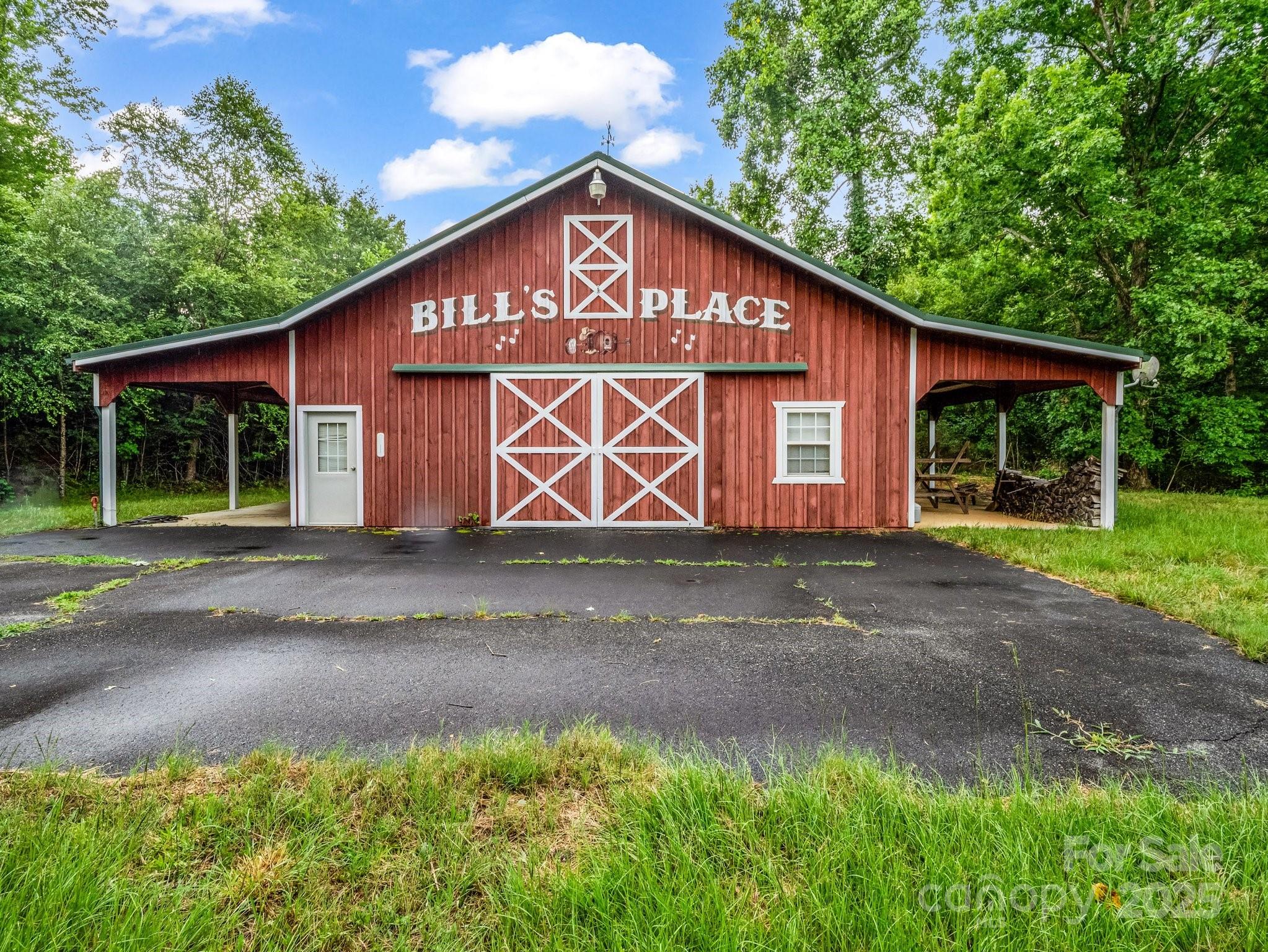 4086 Big Island Road Rutherfordton, NC 28139 - Photo 2 of 47 a front view of a house with garden
