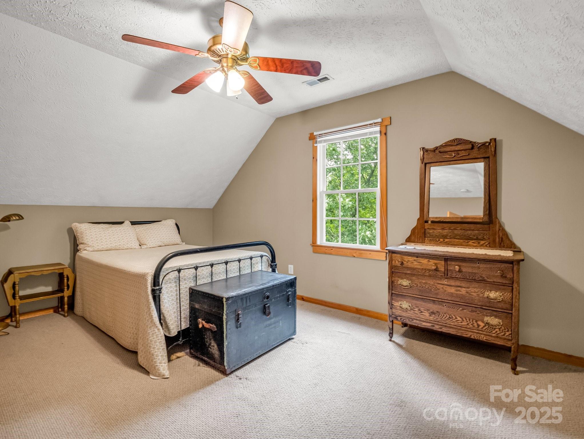 4086 Big Island Road Rutherfordton, NC 28139 - Photo 21 of 47 a bedroom with a bed and a ceiling fan