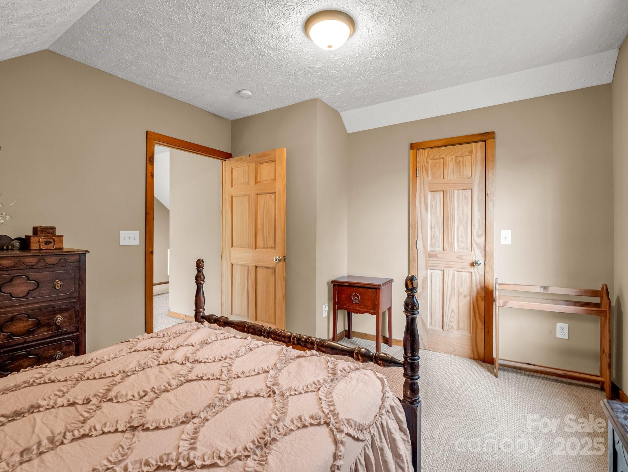 4086 Big Island Road Rutherfordton, NC 28139 - Photo 25 of 47 a bedroom with a bed and a dresser