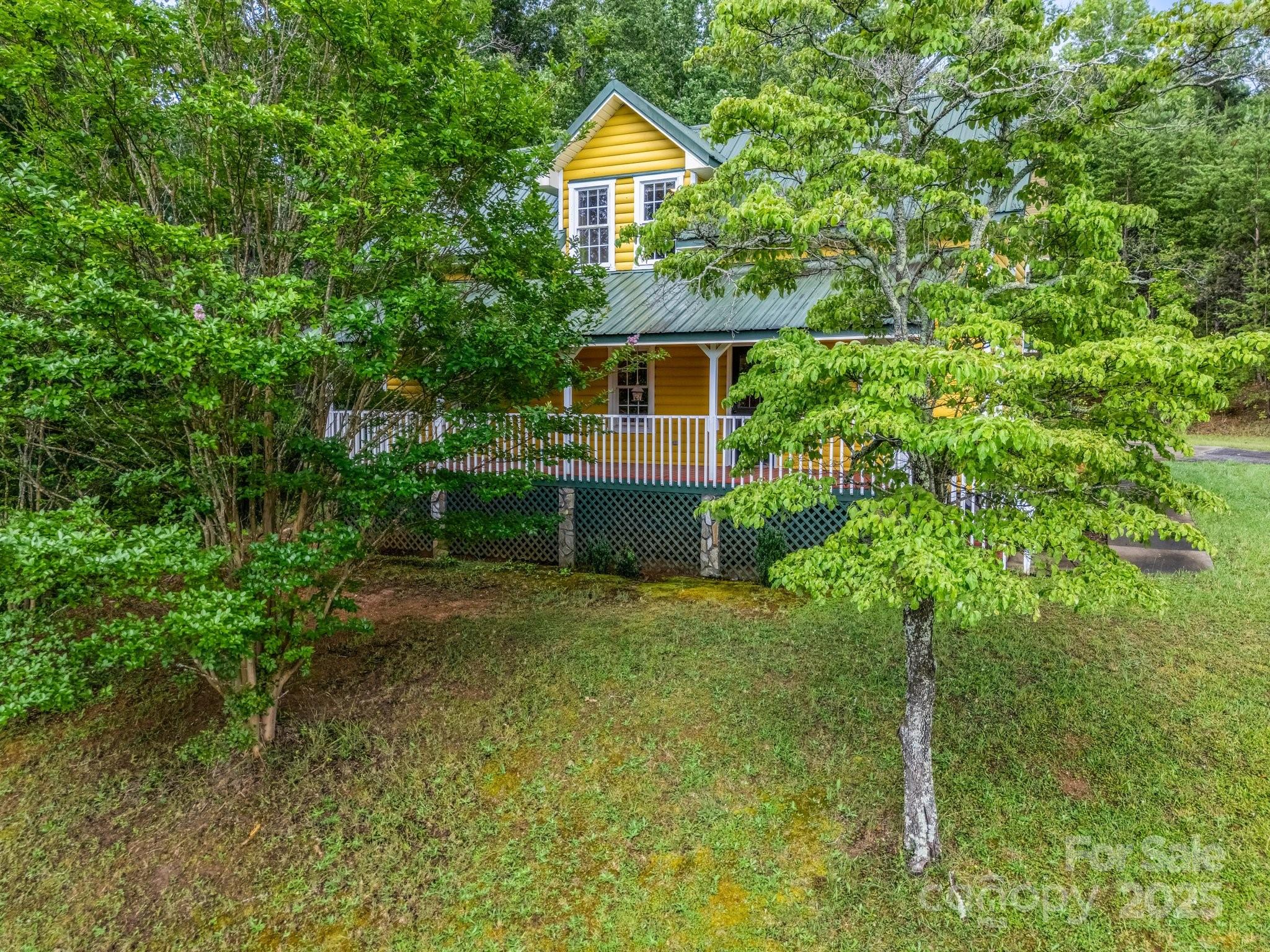 4086 Big Island Road Rutherfordton, NC 28139 - Photo 36 of 47 a front view of a house with a yard and trees