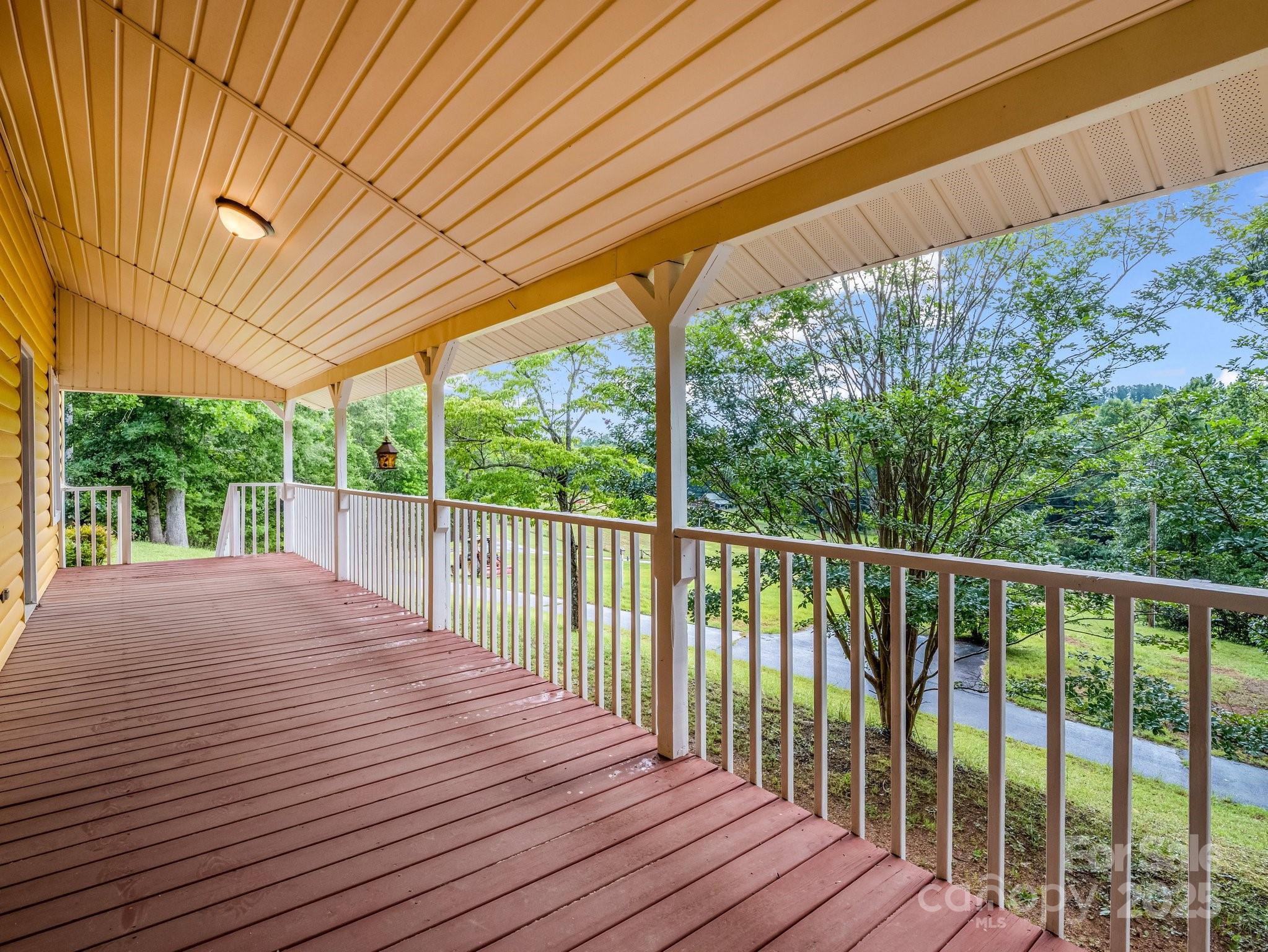 4086 Big Island Road Rutherfordton, NC 28139 - Photo 40 of 47 a balcony with wooden floor and outdoor space