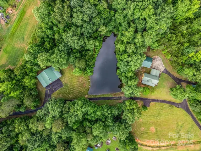 a living room with furniture fireplace and a flat screen tv