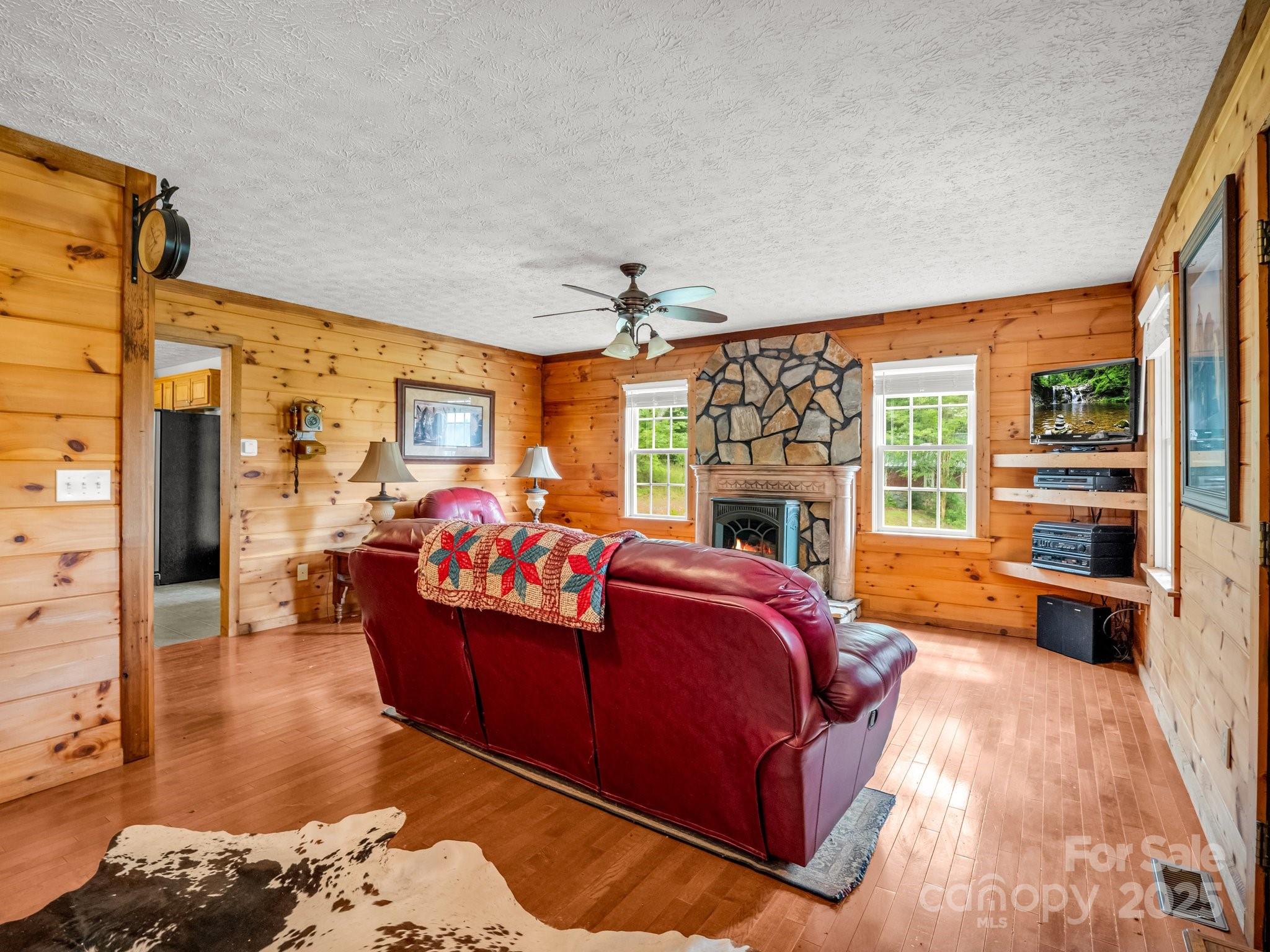 4086 Big Island Road Rutherfordton, NC 28139 - Photo 8 of 47 a living room with furniture fireplace and flat screen tv