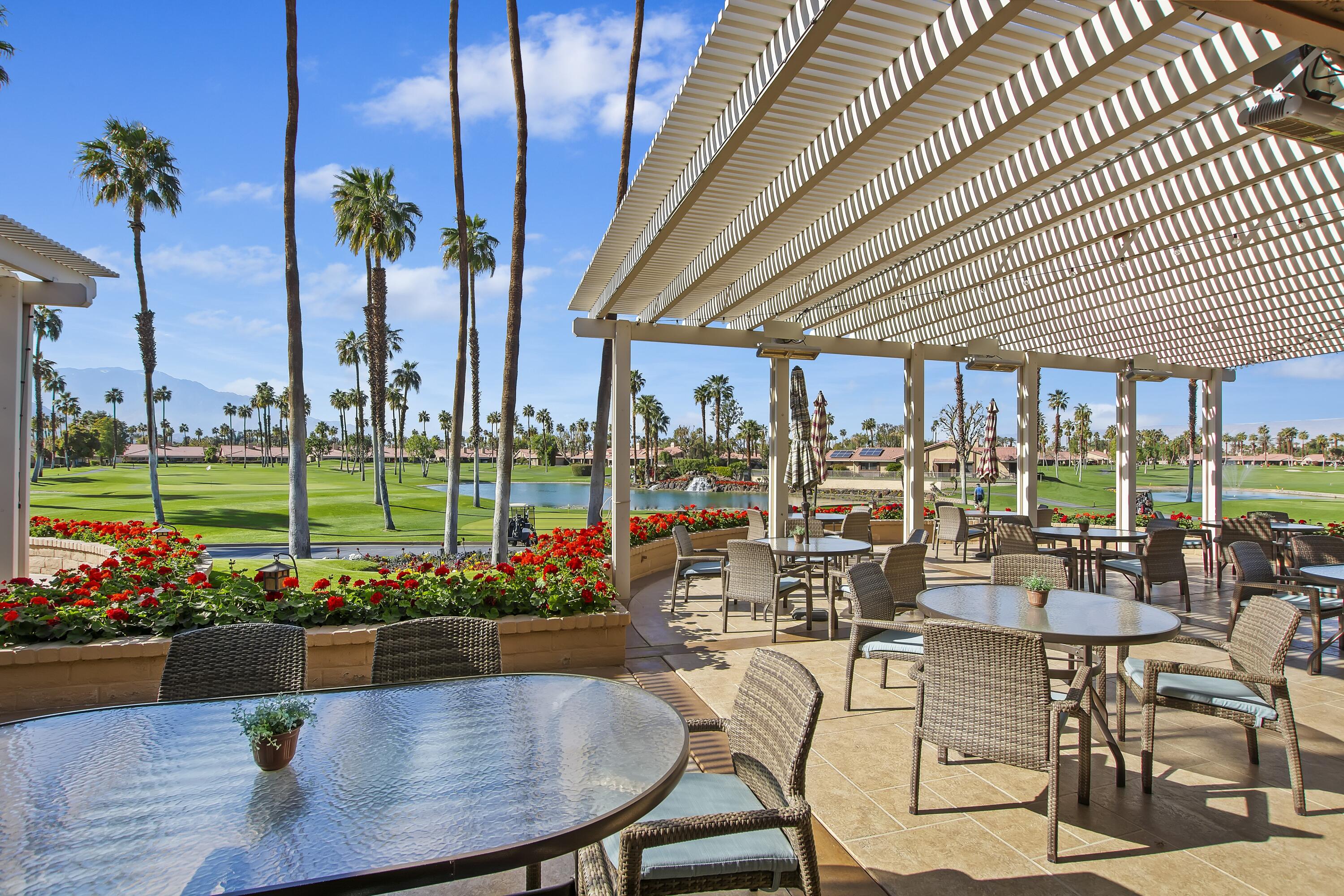 6 Maximo Way Palm Desert, CA 92260 - Photo 48 of 48 a view of a swimming pool with outdoor seating