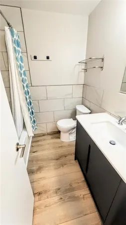 a bathroom with a white bathtub