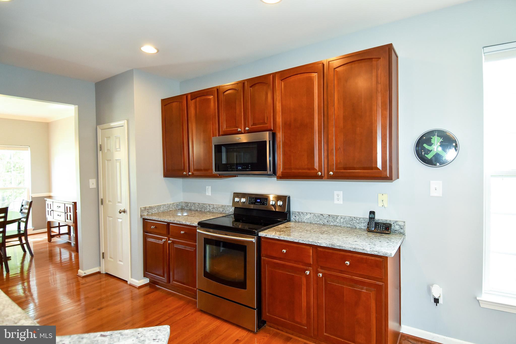 7836 Callington Way Hanover, MD 21076 - Photo 11 of 48 KITCHEN HAS STAINLESS STEEL APPLIANCES