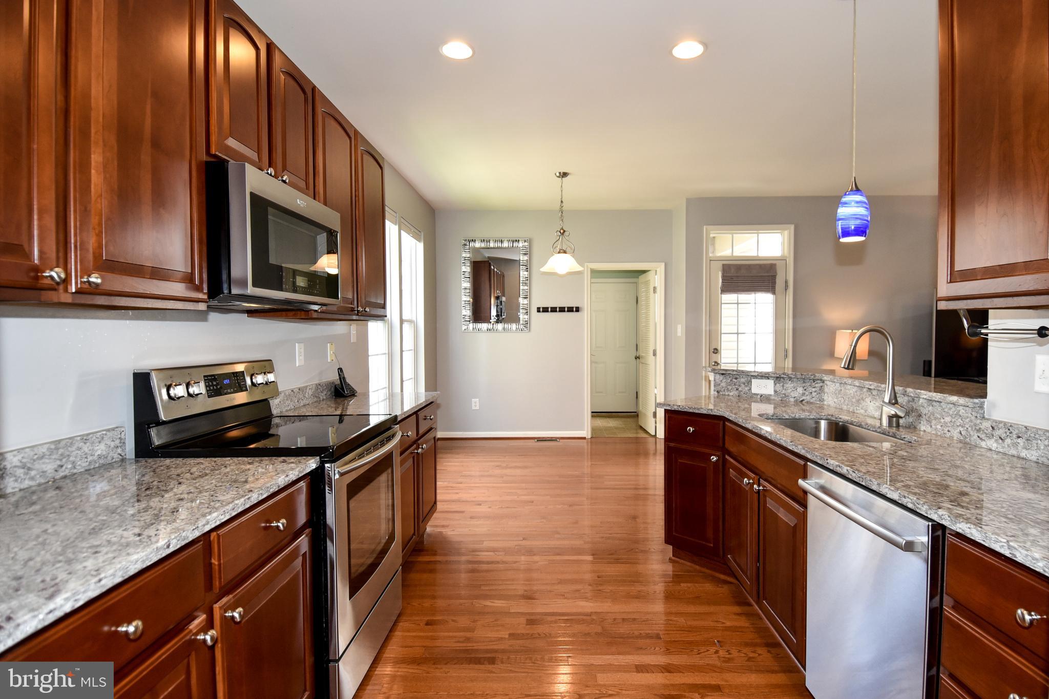 7836 Callington Way Hanover, MD 21076 - Photo 12 of 48 KITCHEN HAS RECESSED LIGHTING AND BREAKFAST ROOM