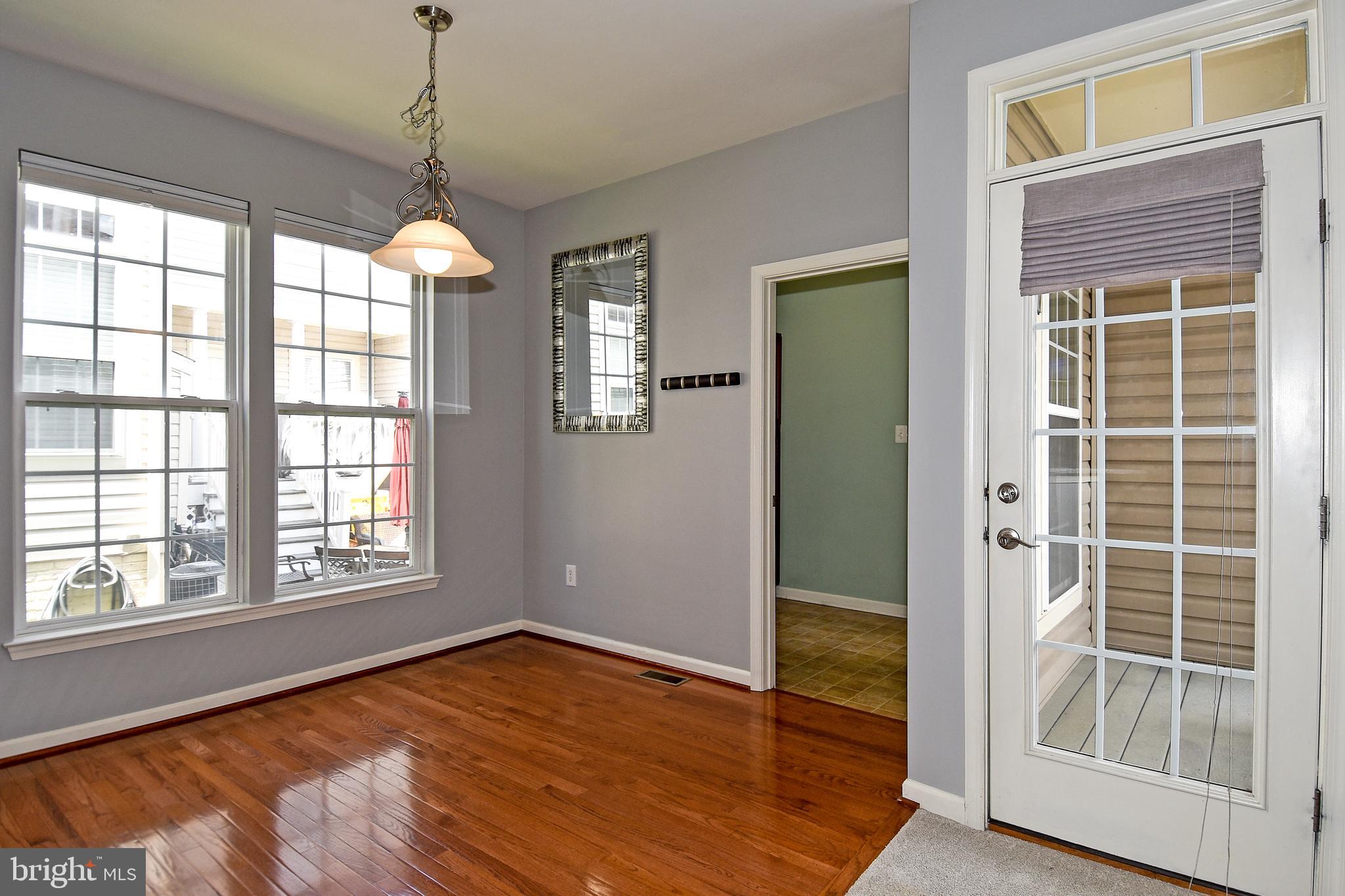 7836 Callington Way Hanover, MD 21076 - Photo 13 of 48 BREAKFAST ROOM AND ENTRANCE TO LAUNDRY ROOM