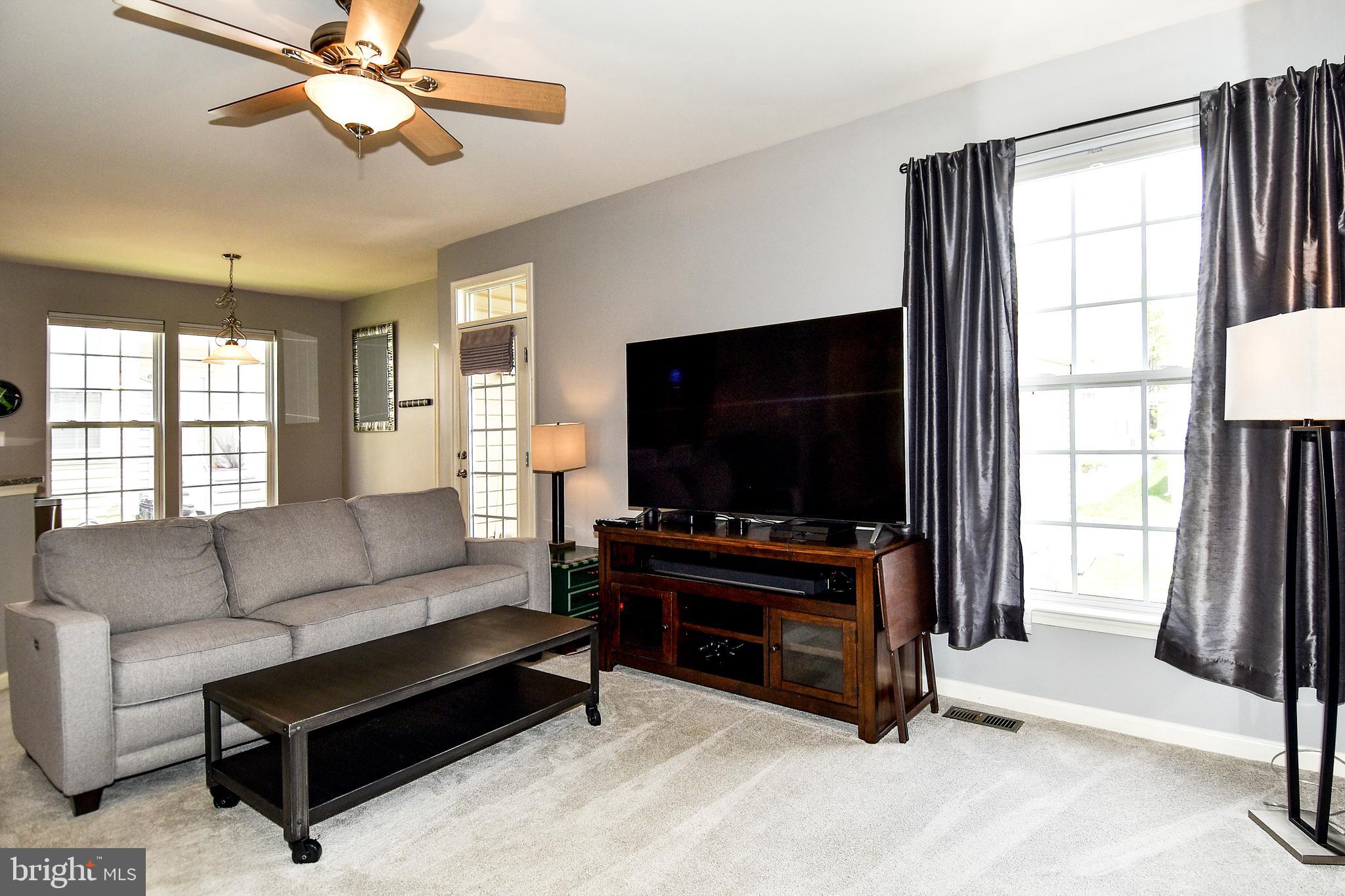 7836 Callington Way Hanover, MD 21076 - Photo 17 of 48 LIVING ROOM DOOR ACCESS TO EXTERIOR SIDE PATIO