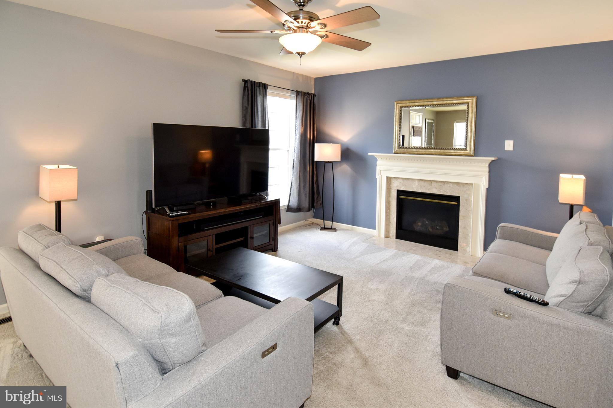 7836 Callington Way Hanover, MD 21076 - Photo 19 of 48 LIVING ROOM HAS LIGHTED CEILING FAN