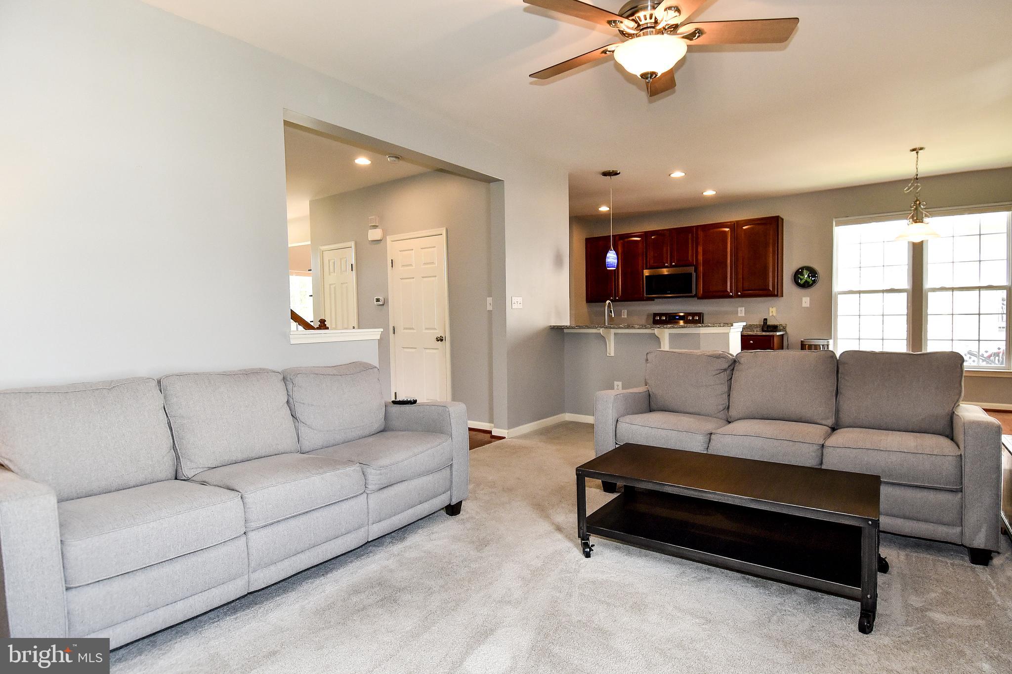 7836 Callington Way Hanover, MD 21076 - Photo 20 of 48 LIVING ROOM AND DOOR ON LEFT IS POWDER ROOM