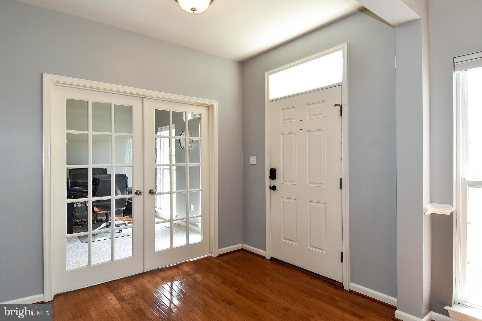 7836 Callington Way Hanover, MD 21076 - Photo 2 of 48 FRONT DOOR FOYER AND OFFICE OR DEN