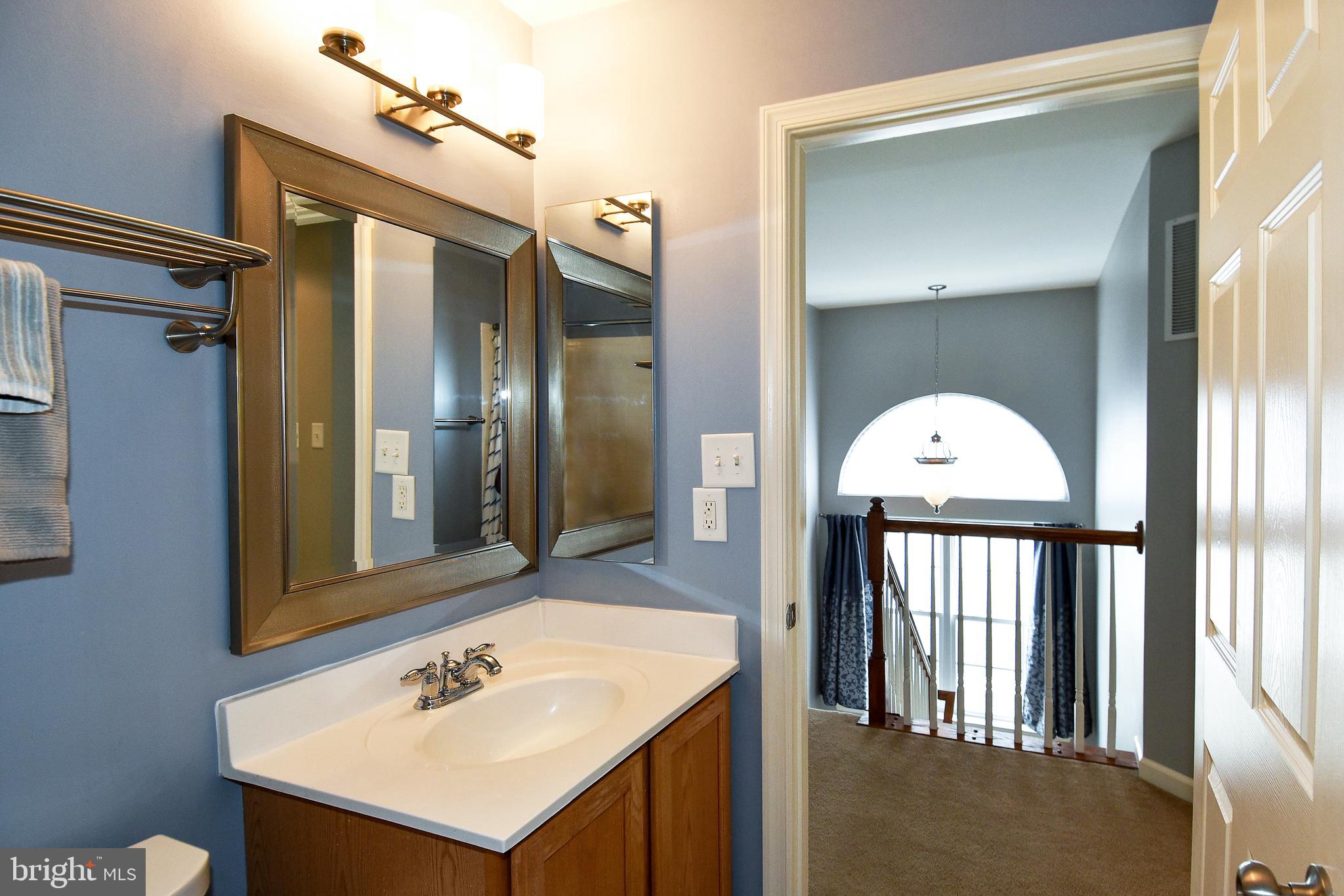7836 Callington Way Hanover, MD 21076 - Photo 36 of 48 UPPER LEVEL HALLWAY AND BATH ROOM