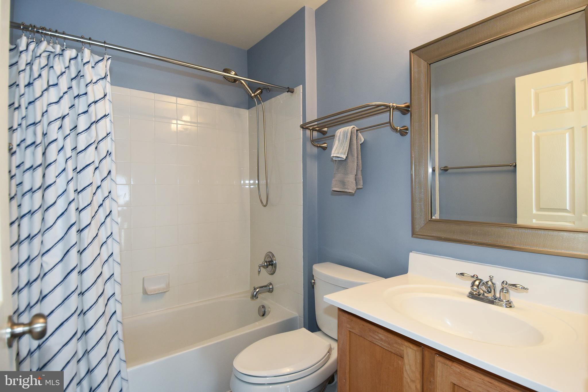 7836 Callington Way Hanover, MD 21076 - Photo 37 of 48 UPPER LEVEL HALLWAY BATHROOM HAS TUB SHOWER