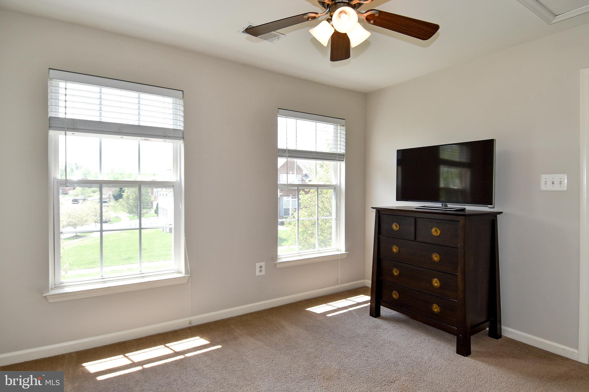 7836 Callington Way Hanover, MD 21076 - Photo 38 of 48 UPPER LEVEL BEDROOM 3 HAS LIGHTED CEILING FAN