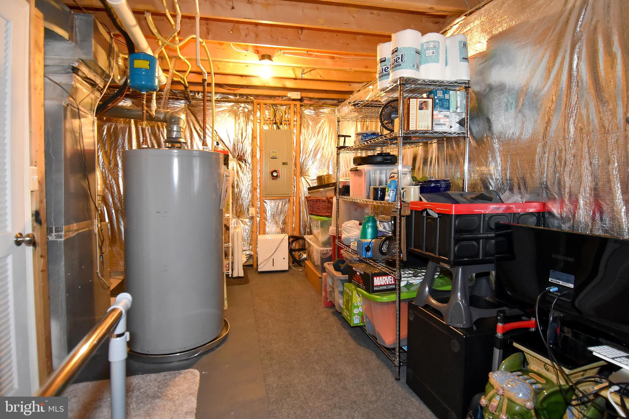 7836 Callington Way Hanover, MD 21076 - Photo 43 of 48 LOWER LEVEL UTILITY ROOM AND TONS OF STORAGE