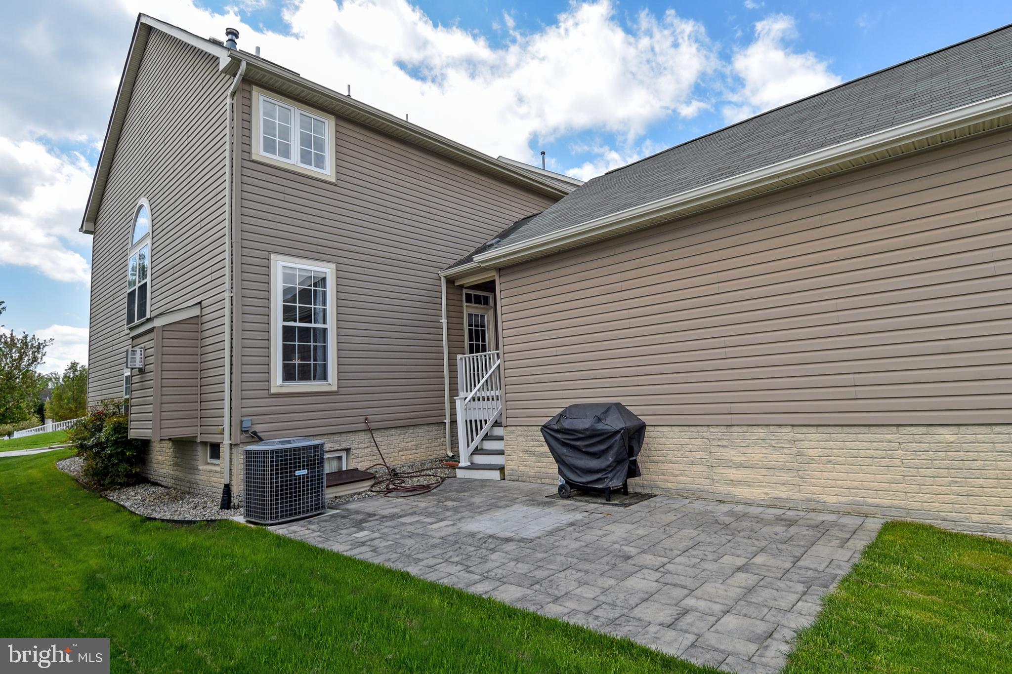 7836 Callington Way Hanover, MD 21076 - Photo 46 of 48 EXTERIOR SIDE PAVERS PATIO GREAT FOR ENTERTAINMENT