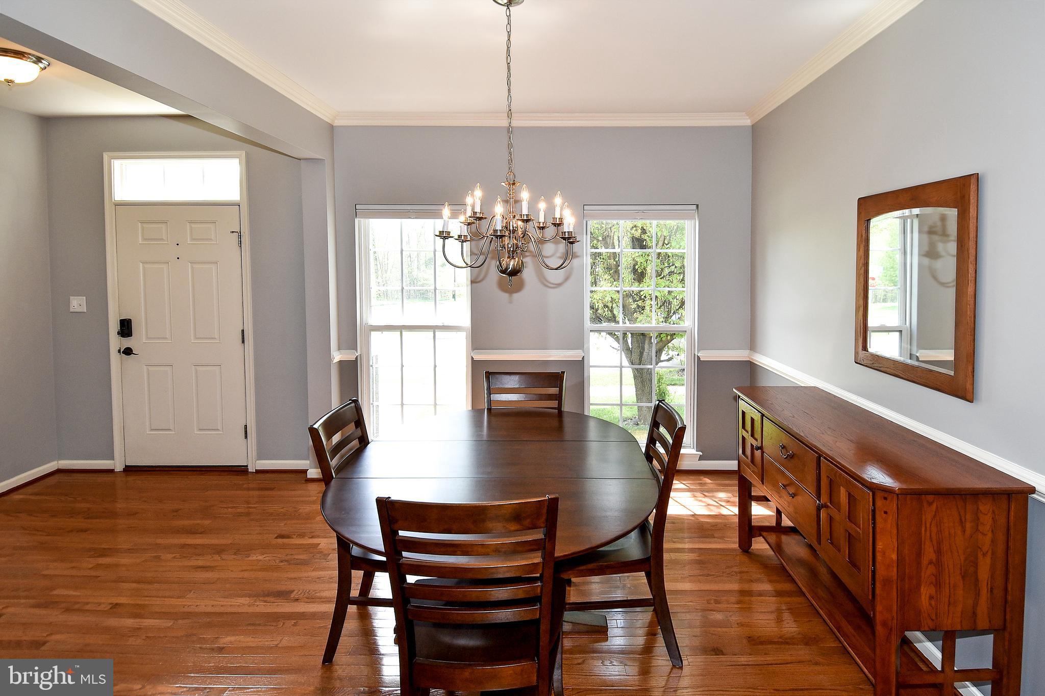 7836 Callington Way Hanover, MD 21076 - Photo 6 of 48 DINING ROOM WINDOWS BRING IN THE NATURAL SUNLIGHT
