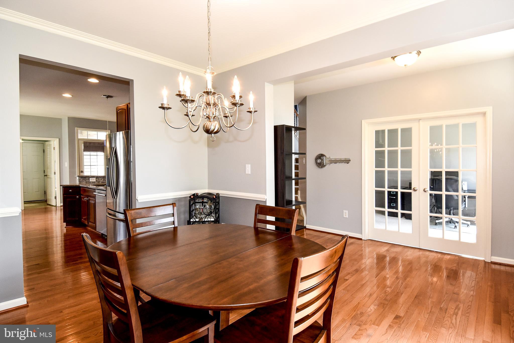 7836 Callington Way Hanover, MD 21076 - Photo 8 of 48 DINING ROOM HAS HARDWOOD FLOORS