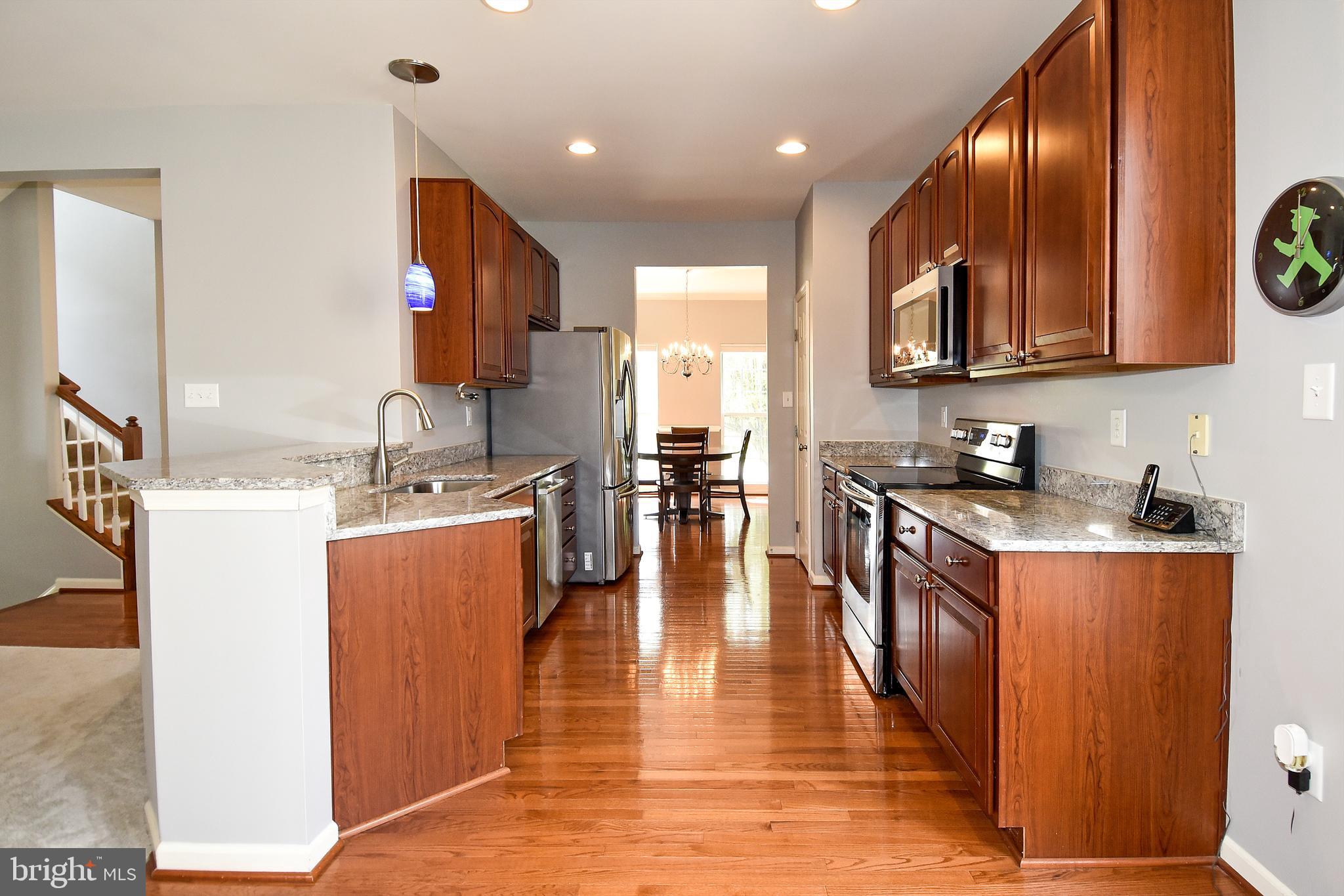 7836 Callington Way Hanover, MD 21076 - Photo 9 of 48 DINING ROOM ACCESS TO KITCHEN