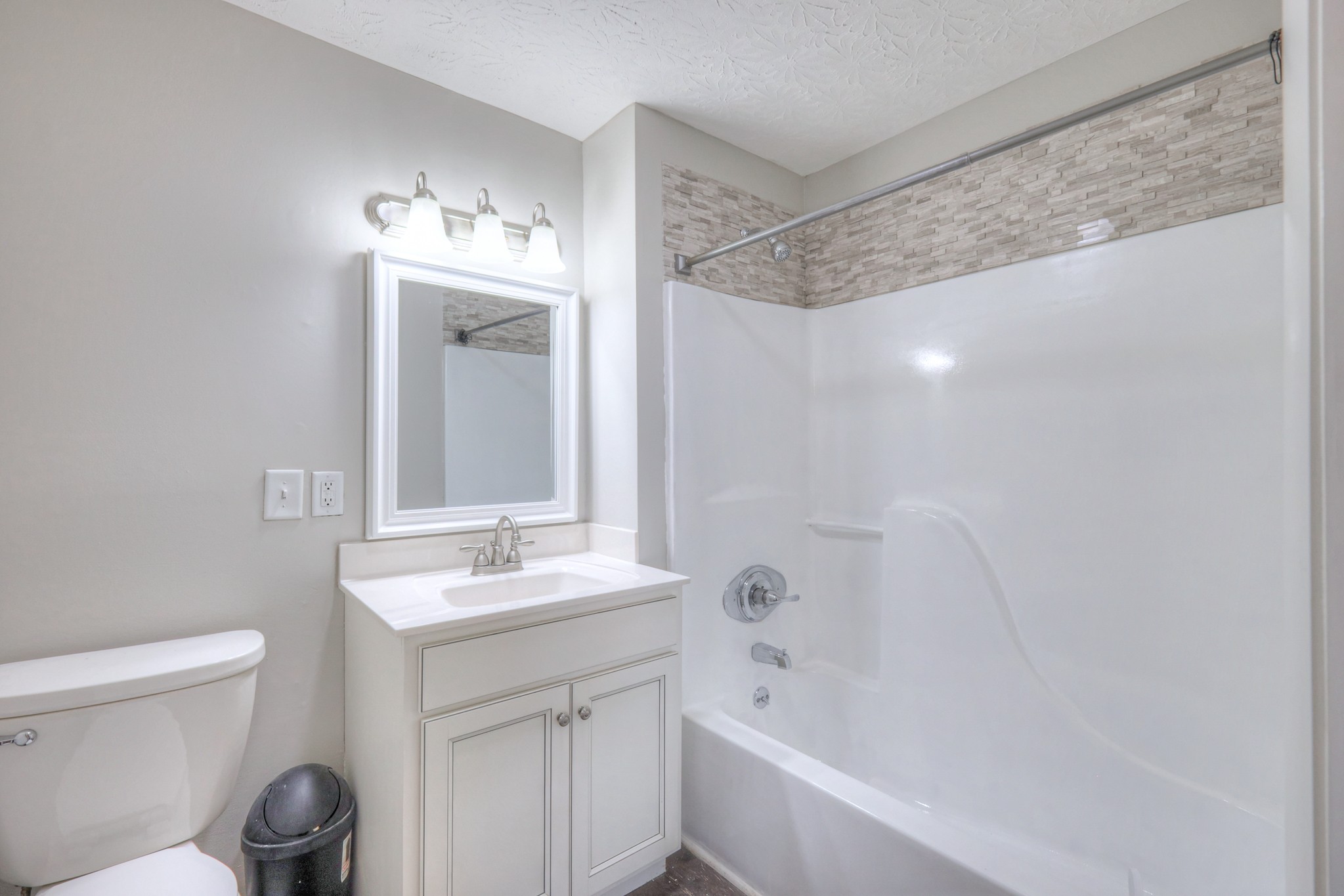 320 Ramsey Road Lebanon, TN 37087 - Photo 17 of 28 a bathroom with a sink a toilet and shower