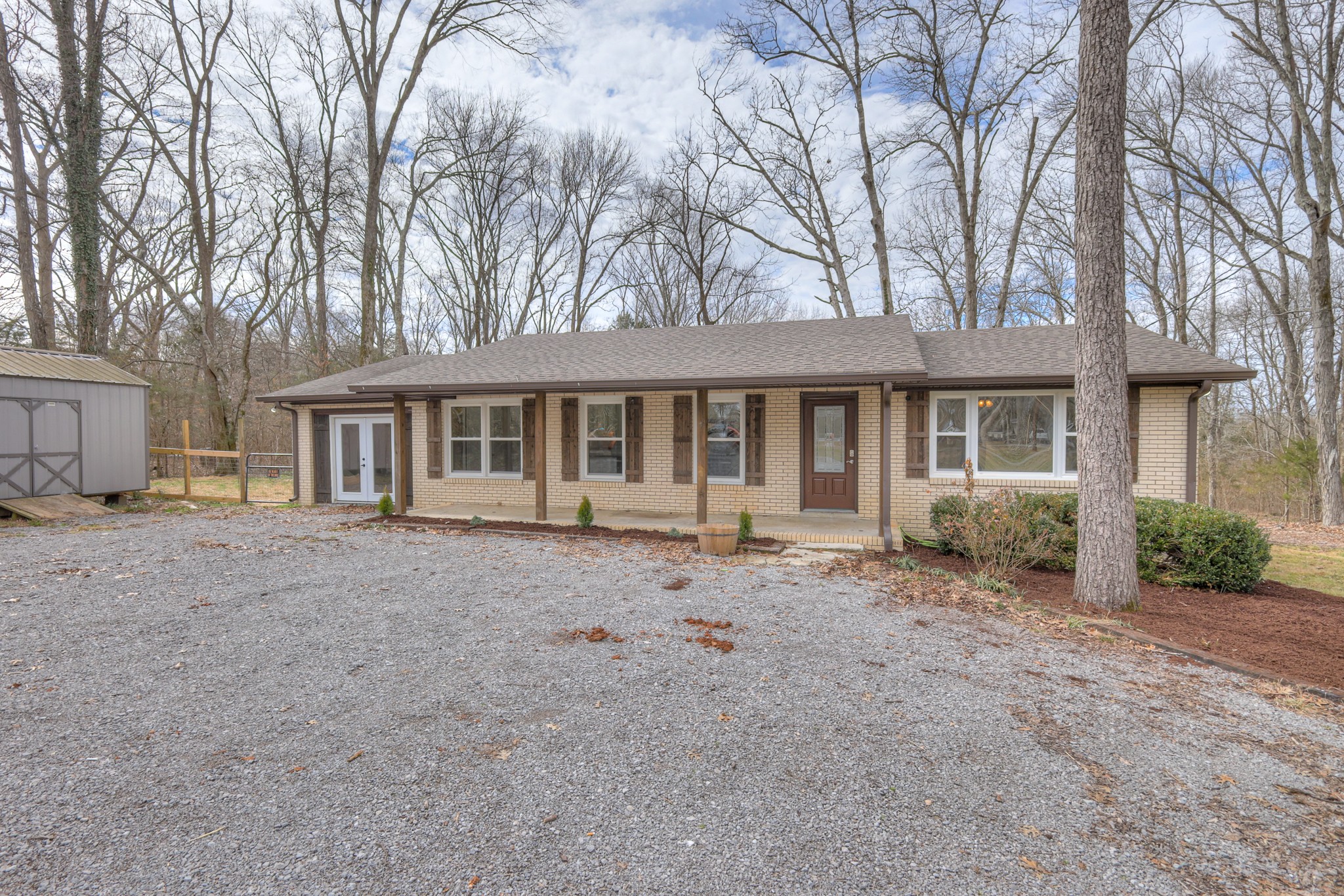 320 Ramsey Road Lebanon, TN 37087 - Photo 24 of 28 a front view of a house with a garden