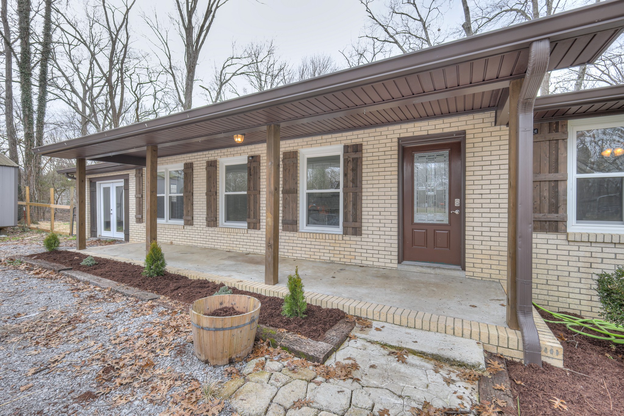 320 Ramsey Road Lebanon, TN 37087 - Photo 25 of 28 a front view of a house with a yard