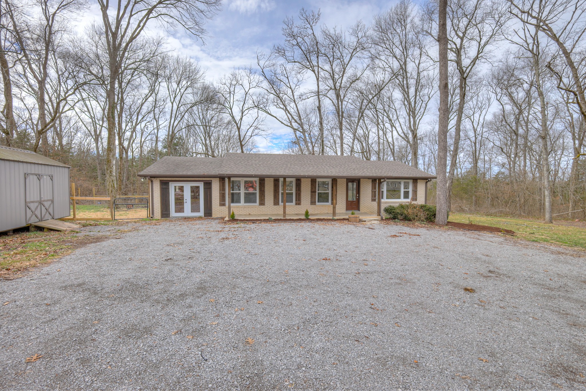 320 Ramsey Road Lebanon, TN 37087 - Photo 3 of 28 a view of a house with a yard and balcony