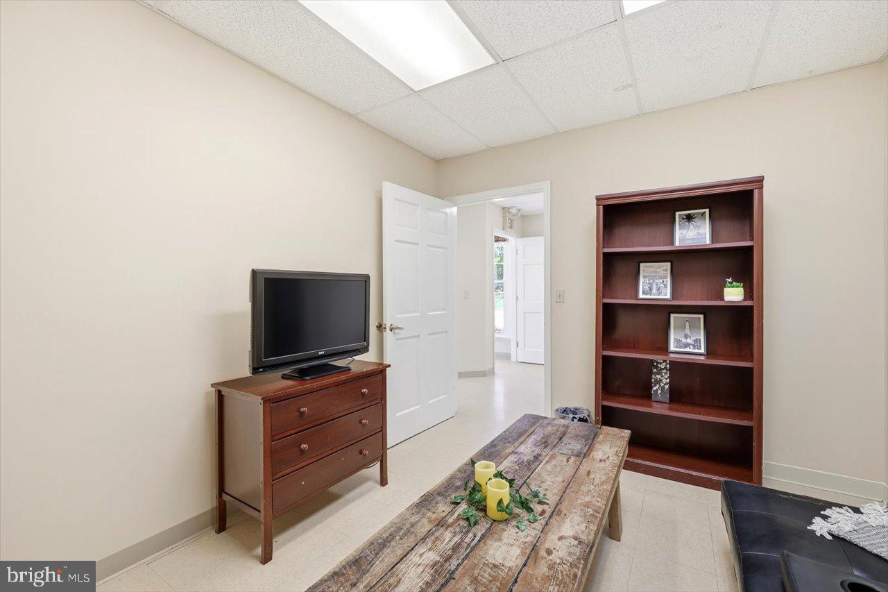 38 Cherry Grove Road Middlebrook, VA 24459 - Photo 13 of 31 a living room with furniture and a flat screen tv