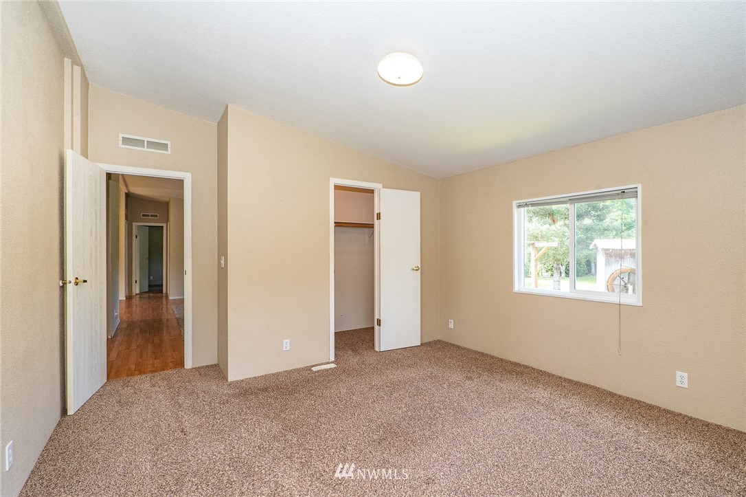 144 Hershel Road Chehalis, WA 98532 - Photo 14 of 40 a view of an empty room with window and closet area