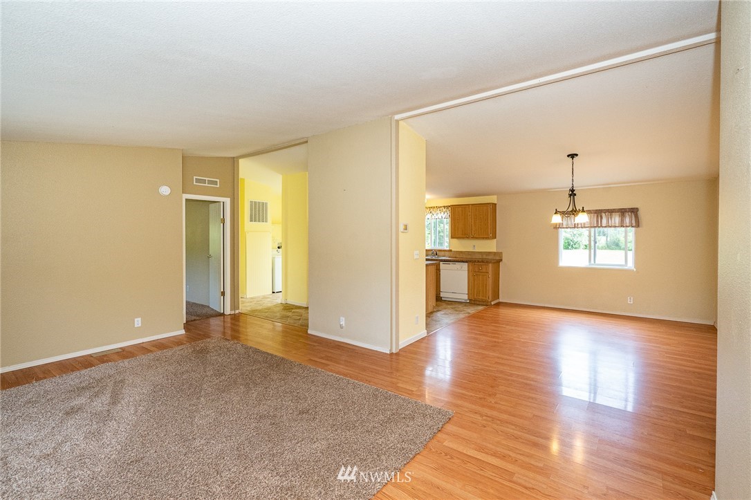 144 Hershel Road Chehalis, WA 98532 - Photo 5 of 40 wooden floor in an empty room with a window