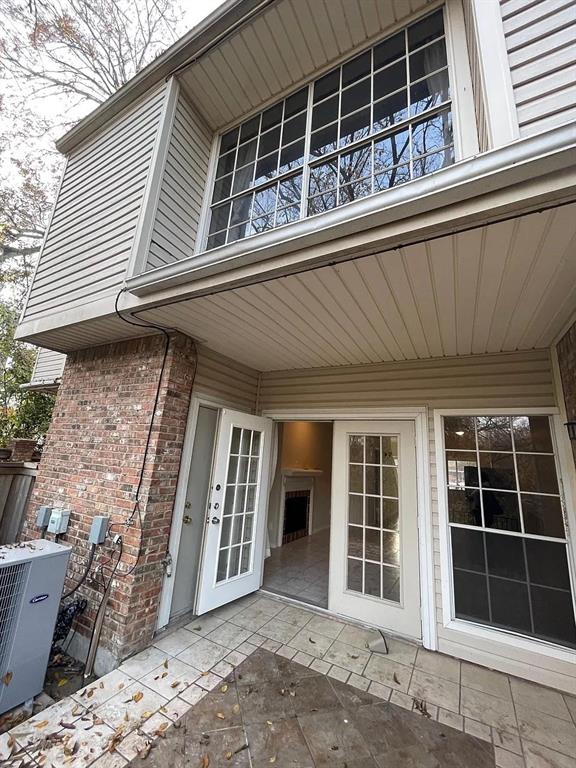 6315 Campbell Road, Unit 602 Dallas, TX 75248 - Photo 14 of 40 a front view of a house with large windows