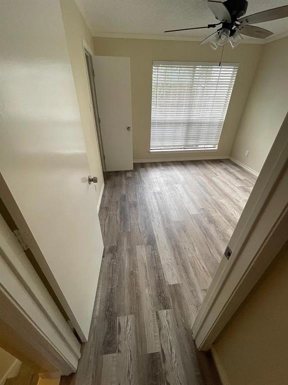 6315 Campbell Road, Unit 602 Dallas, TX 75248 - Photo 20 of 40 wooden floor in an empty room