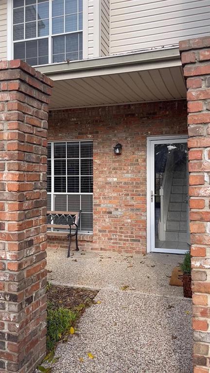 6315 Campbell Road, Unit 602 Dallas, TX 75248 - Photo 3 of 40 a front view of a house with a yard