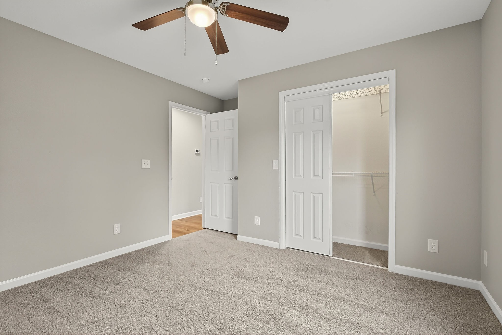 1193 Ashburn Road Monterey, TN 38574 - Photo 11 of 28 an empty room with chandelier fan