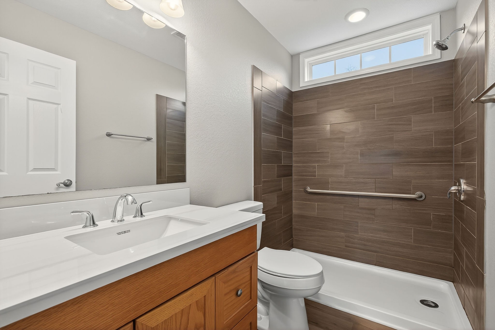1193 Ashburn Road Monterey, TN 38574 - Photo 12 of 28 a bathroom with a sink a toilet and shower