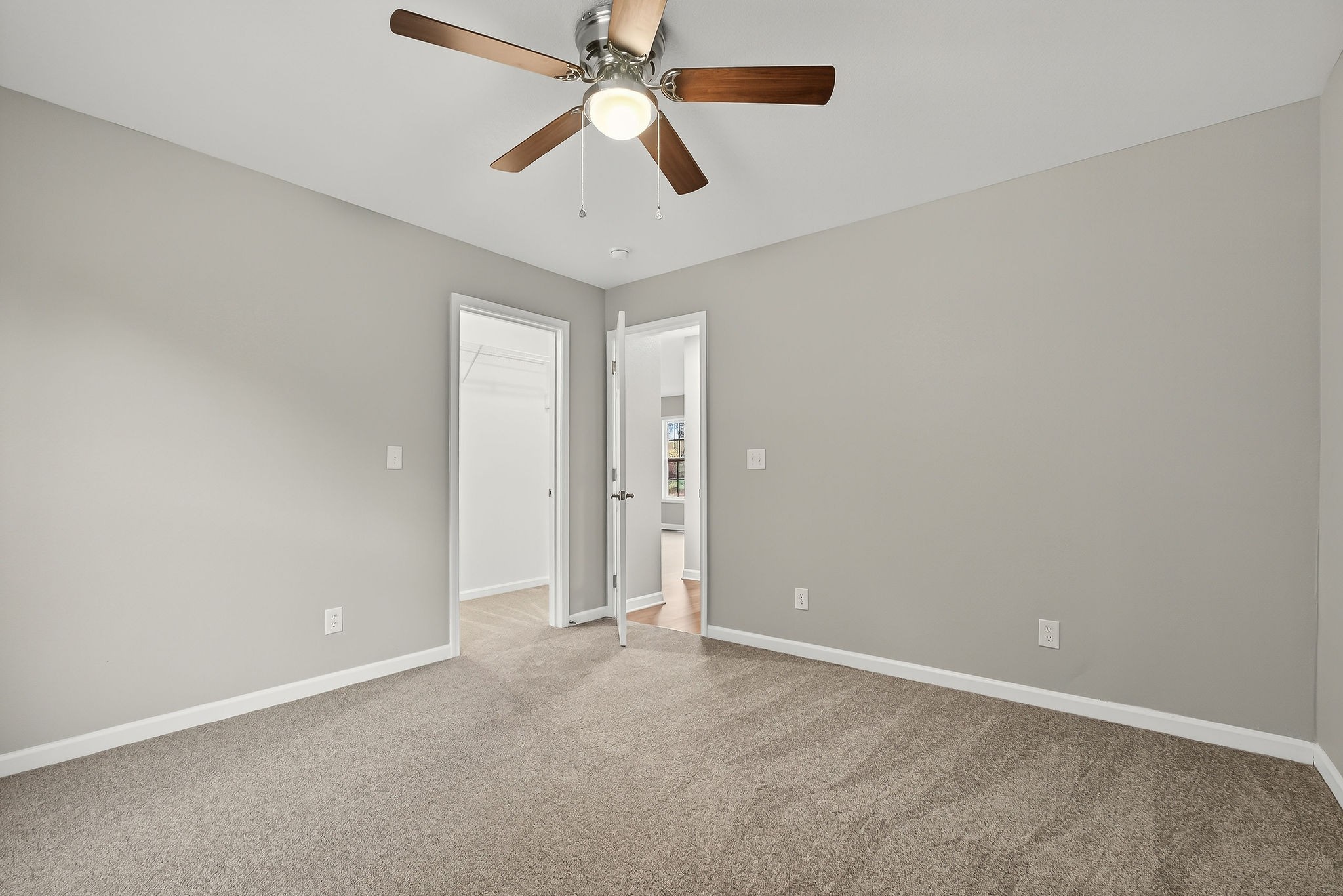 1193 Ashburn Road Monterey, TN 38574 - Photo 15 of 28 an empty room with chandelier fan