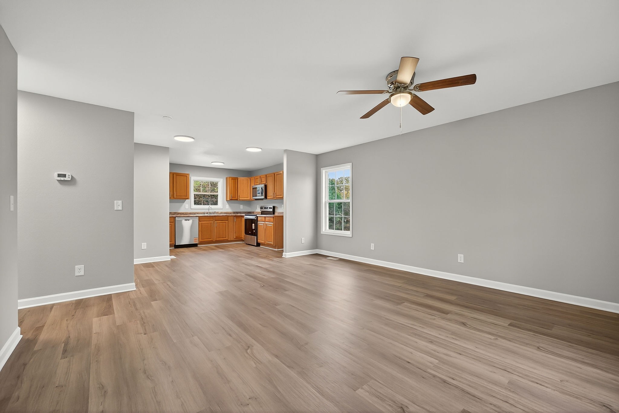 1193 Ashburn Road Monterey, TN 38574 - Photo 2 of 28 a view of empty room with wooden floor and window