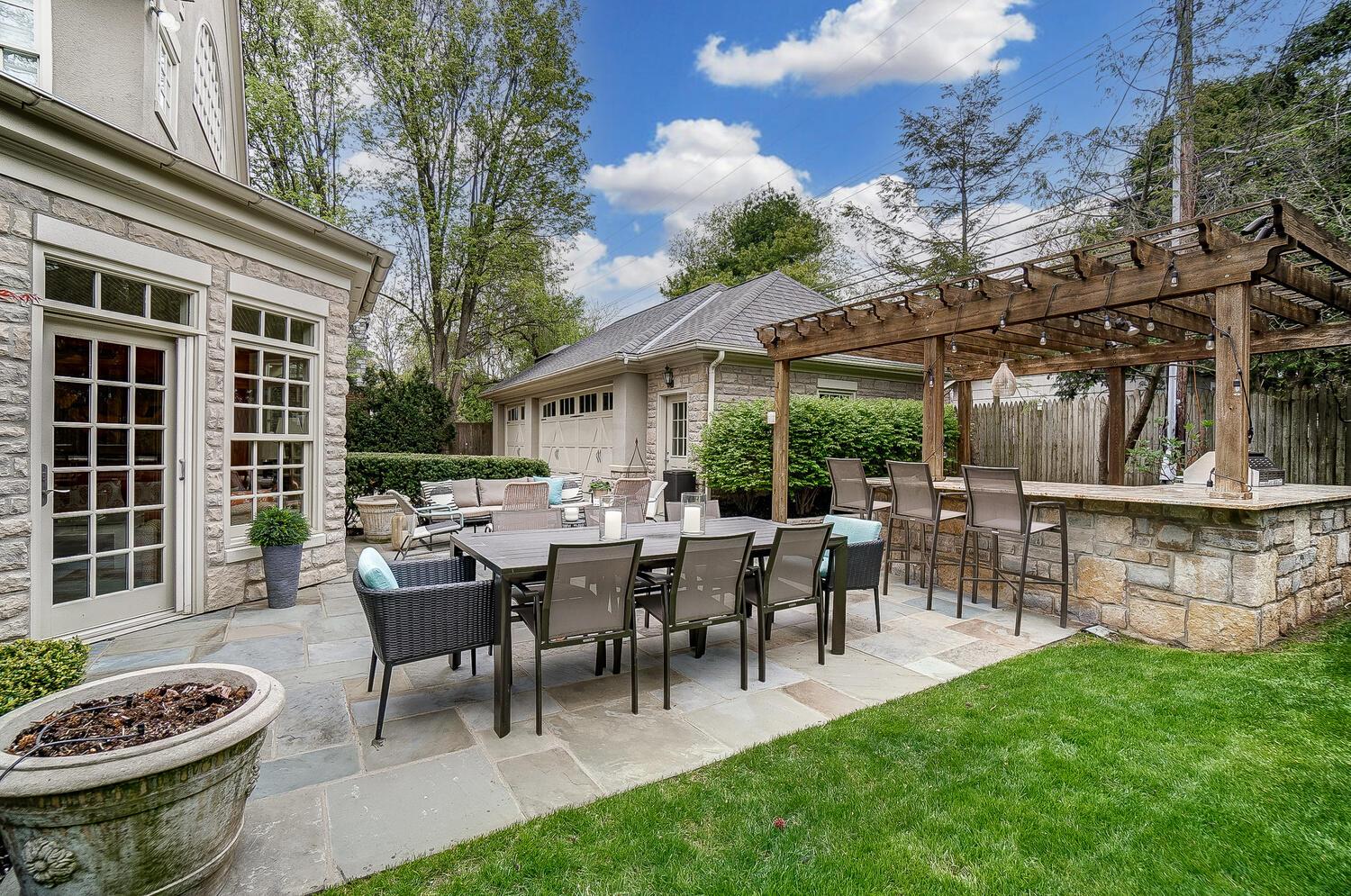 2252 Tremont Road Columbus, OH 43221 - Photo 82 of 97 Added outdoor kitchen, two- level patio and spacious backyard with mature landscaping