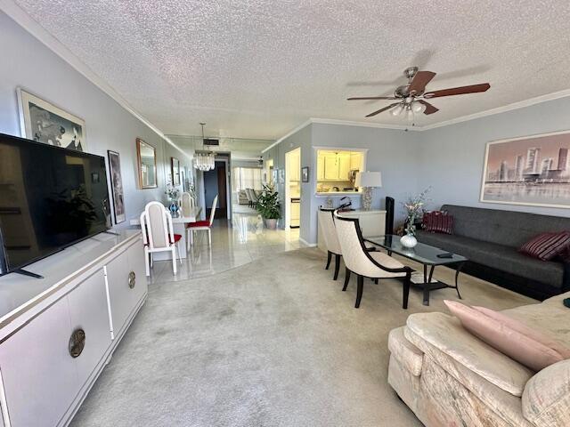 30 Suffolk A Boca Raton, FL 33434 - Photo 4 of 34 a living room with furniture and a flat screen tv