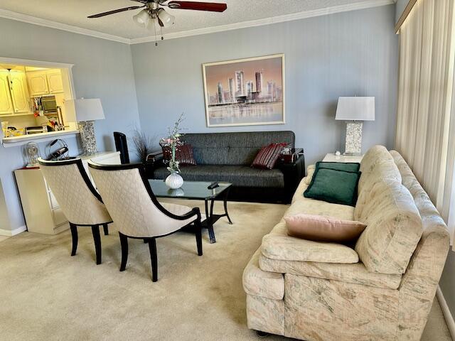 30 Suffolk A Boca Raton, FL 33434 - Photo 5 of 34 a living room with furniture and a lamp