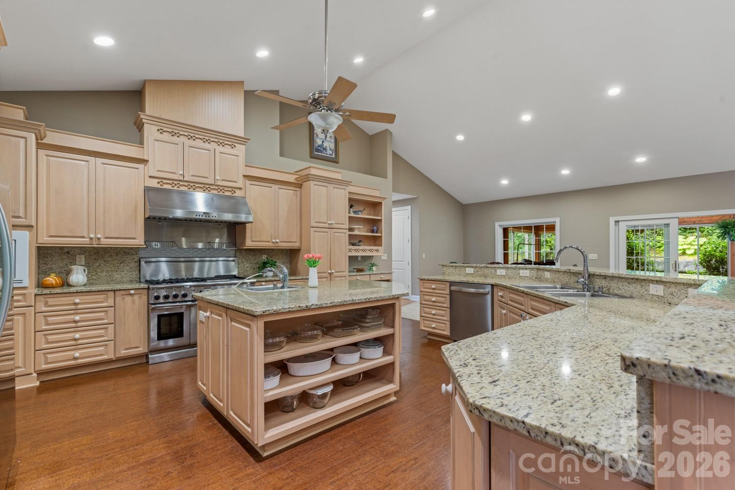 6 Grouse Terrace Fairview, NC 28730 - Photo 11 of 46 a kitchen with stainless steel appliances granite countertop a stove and a sink