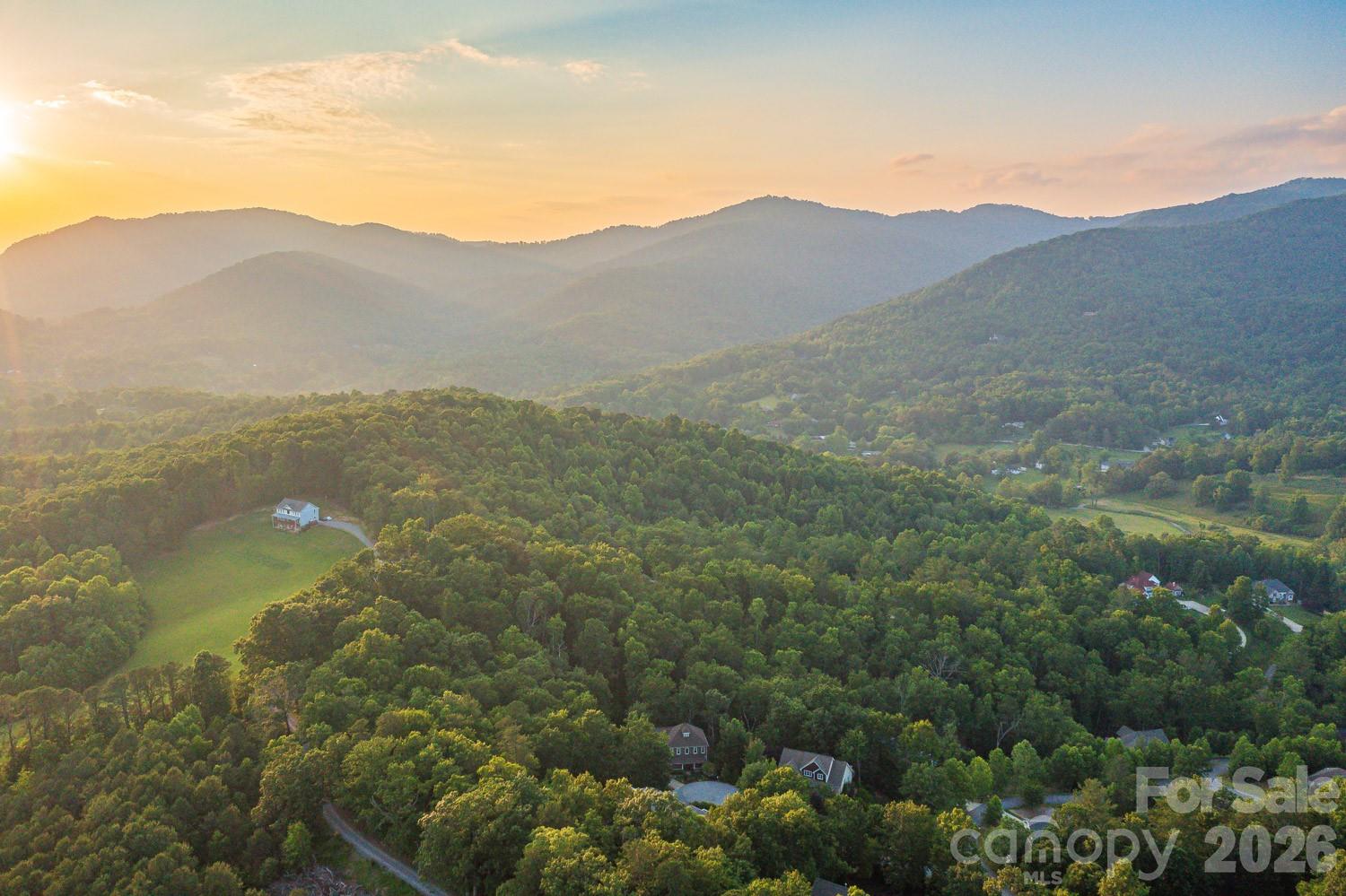 6 Grouse Terrace Fairview, NC 28730 - Photo 3 of 46 a view of a town with mountains in the background