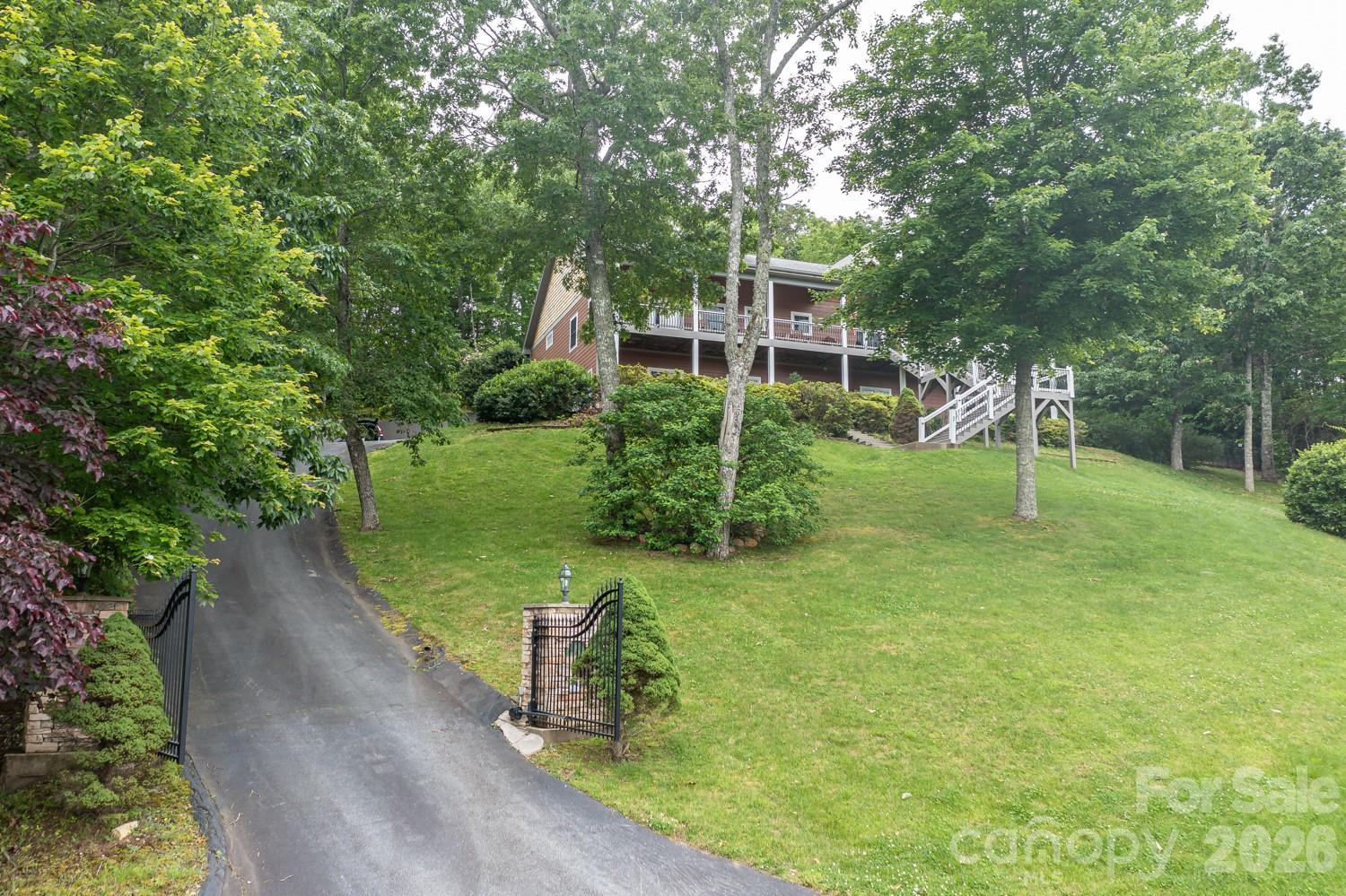 6 Grouse Terrace Fairview, NC 28730 - Photo 39 of 46 a view of a house with a yard